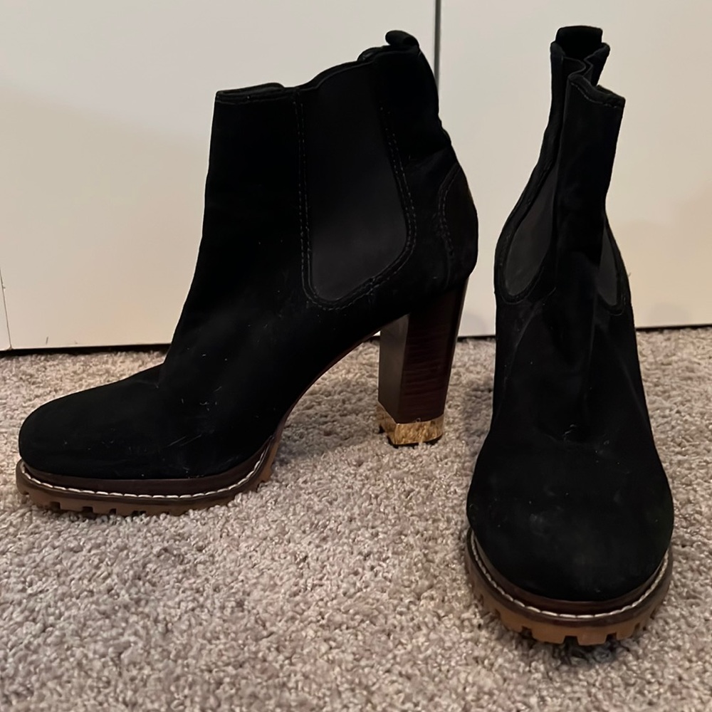Tory Burch Weatherproof stack heeled booties.